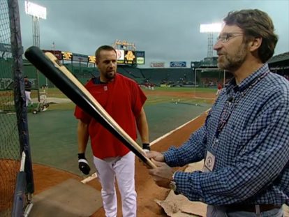 Norm Abram with a baseball bat